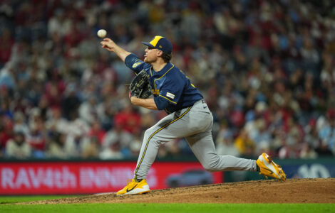 Brewers reach 100 wins for first time, slow Phillies' playoff push with 5-1 victory